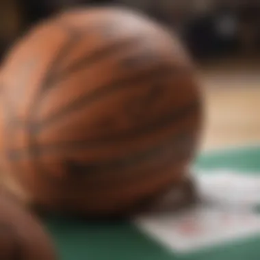 A close-up of a basketball and betting slip