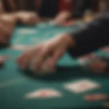 A close-up of a hand placing a bet on a blackjack table.